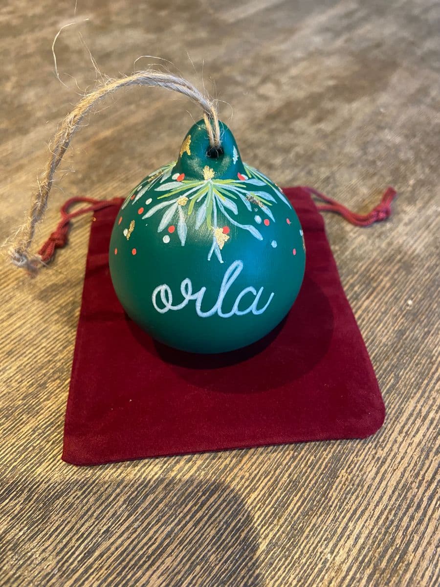 Green Personalised Ceramic Christmas Bauble personalised with a name